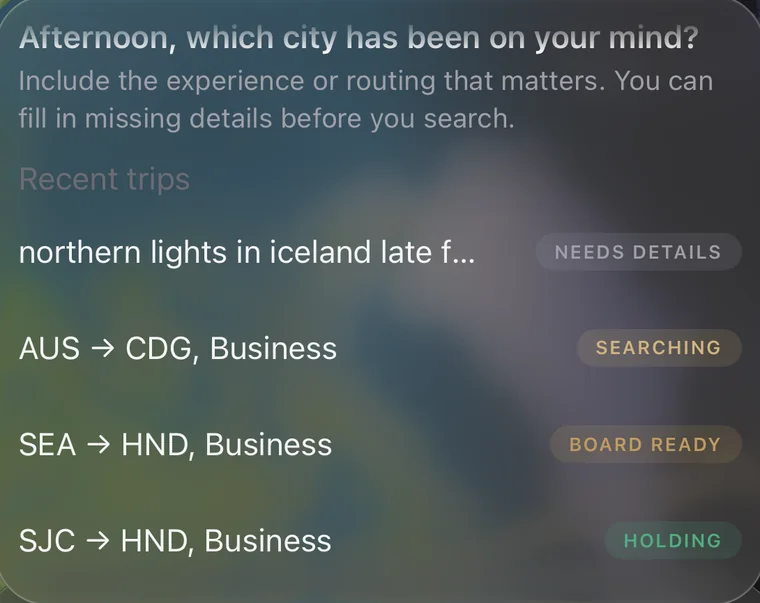 The Agent panel: a greeting by the hour, a hint about what to include, and recent trips with their states.